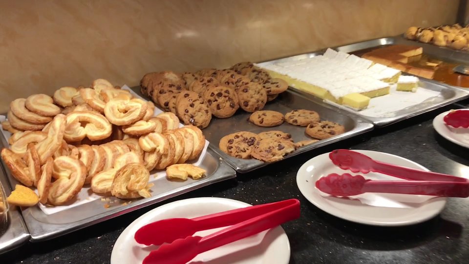 Salad bar and hot buffet stations.